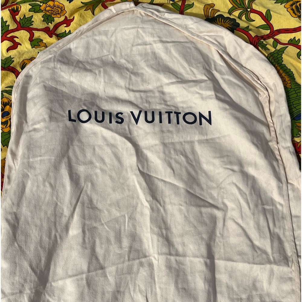 Louis Vuitton clothing bag and various designer shoe bags